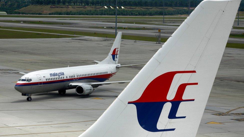 Malaysian Airlines aircraft on the tarmac at Kuala Lumpur International Airport