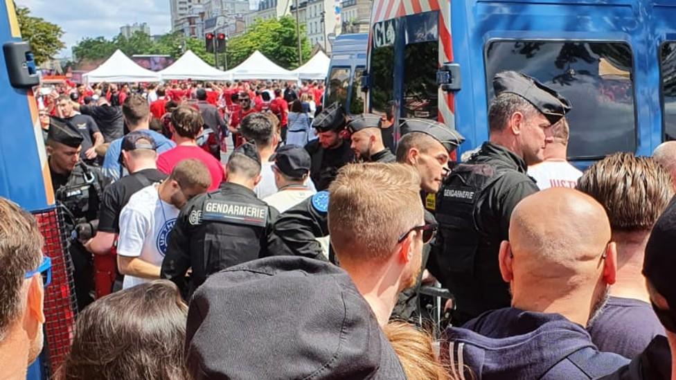 Police vans parked in a Liverpool fan zone in Paris