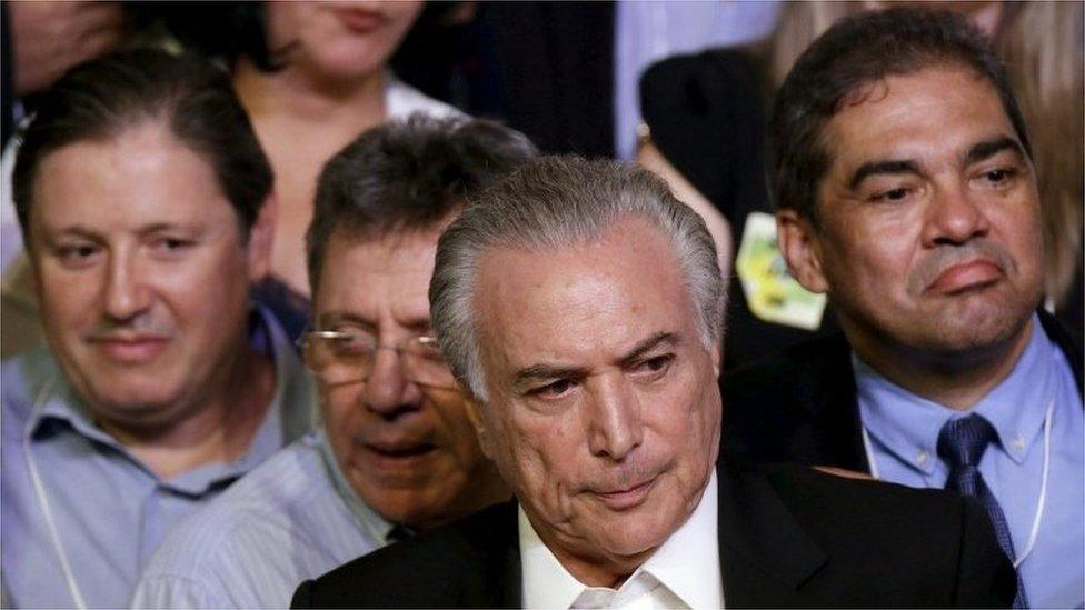 Brazil's Vice President Michel Temer (C) looks on during the Brazilian Democratic Movement Party (PMDB) national convention in Brasilia, Brazil, March 12, 2016