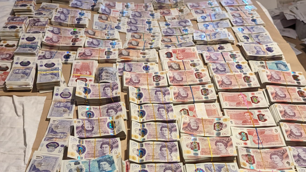 Some of the money seized by police