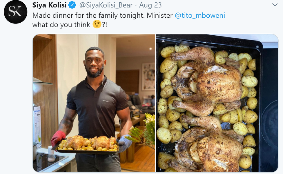 Siya Kolisi holding roast chicken