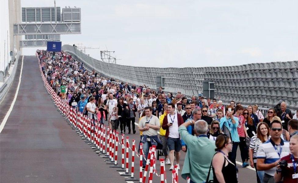 Pedestrians on bridge