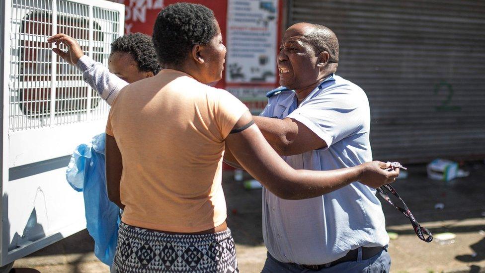 Policeman confronting a woman