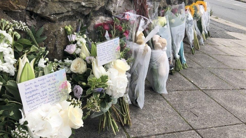 Flowers left at the scene of killings in Plymouth, Devon in 2021