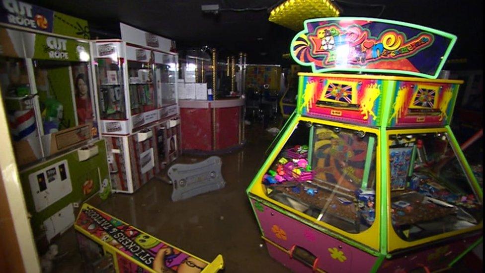 A flooded amusement arcade