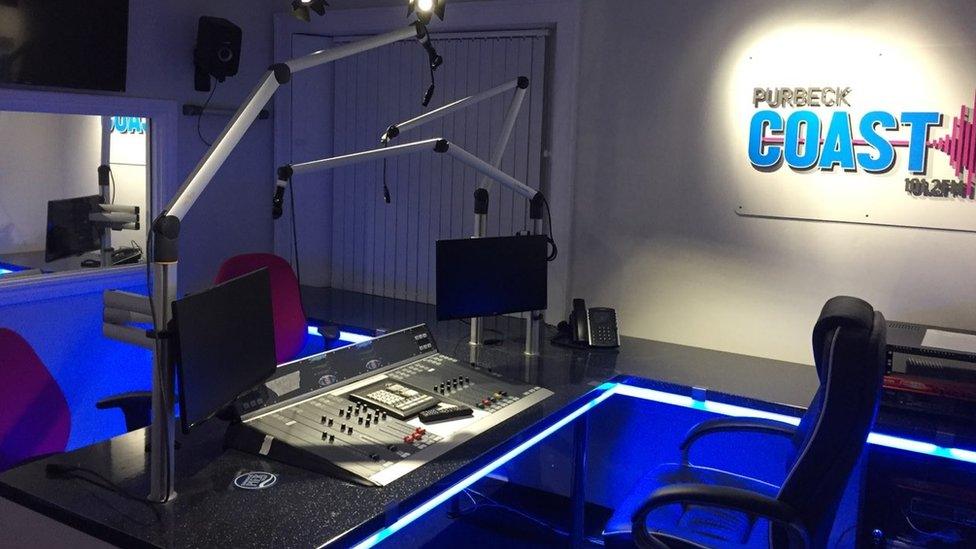 Purbeck Coast Radio studio bathed in blue lights