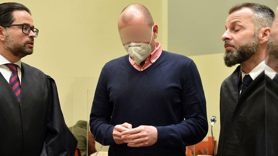 Sports doctor Mark Schmidt (c) in court in Munich during his trial, 15 Jan 2021
