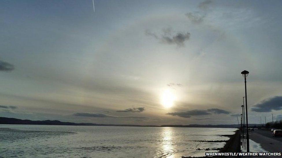 Wide shot of the sea and Sun halo