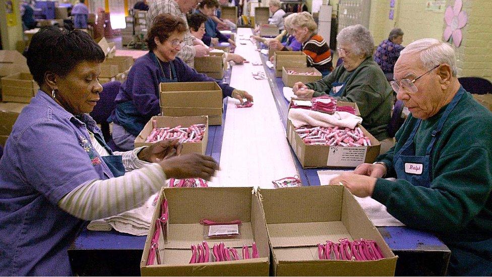 Workers in the senior section package cosmetics on the assembly line at the Bonne Bell cosmetics factory in Lakewood, Ohio, 05, March, 2001