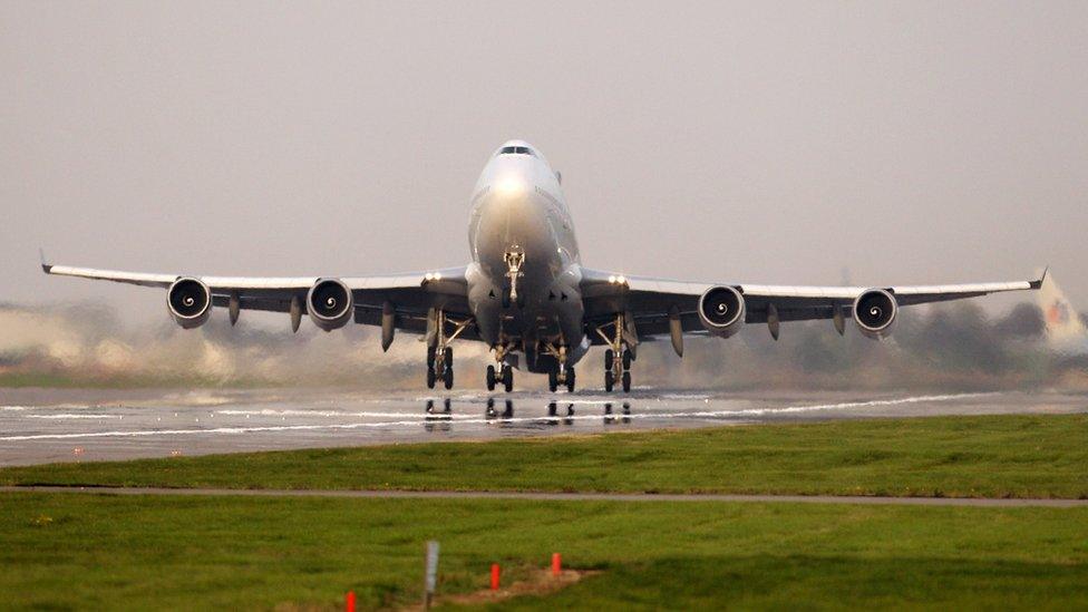 A passenger plane takes off from Heathrow airport