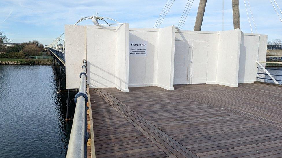 Southport Pier with boards closing it off to the public