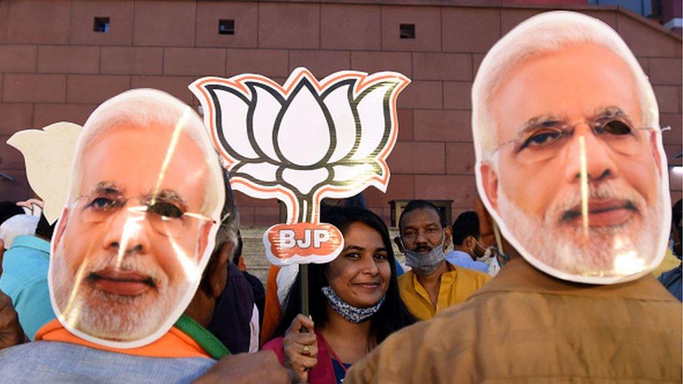 BJP Supporter and activist celebrating BJP Leading win Bihar assembly election at Delhi BJP HQ on November 10, 2020 in New Delhi, India. The NDA maintained an edge over the RJD-led Grand Alliance as counting progressed slowly in Bihar.