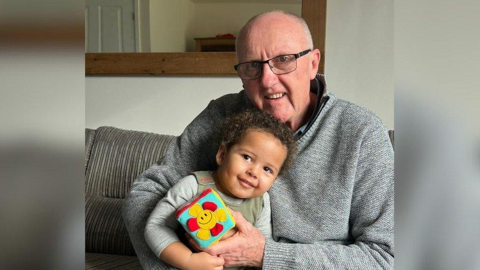 Asher Meek with his grandfather Chris Meek