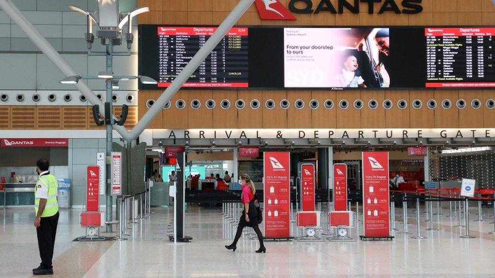 A mostly empty domestic terminal at Sydney Airport is seen after surrounding states shut their borders to New South Wales in response to an outbreak of the coronavirus disease.