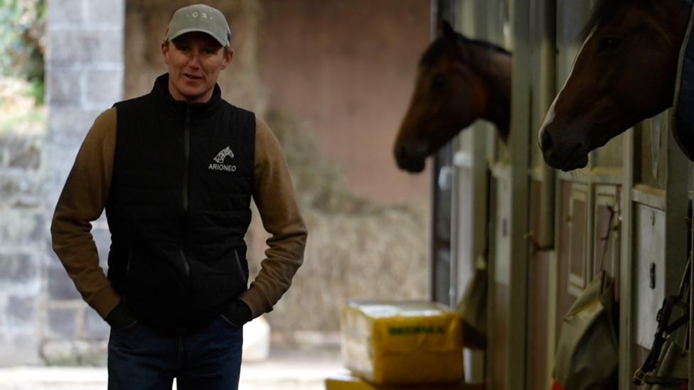 George Scott in the stables