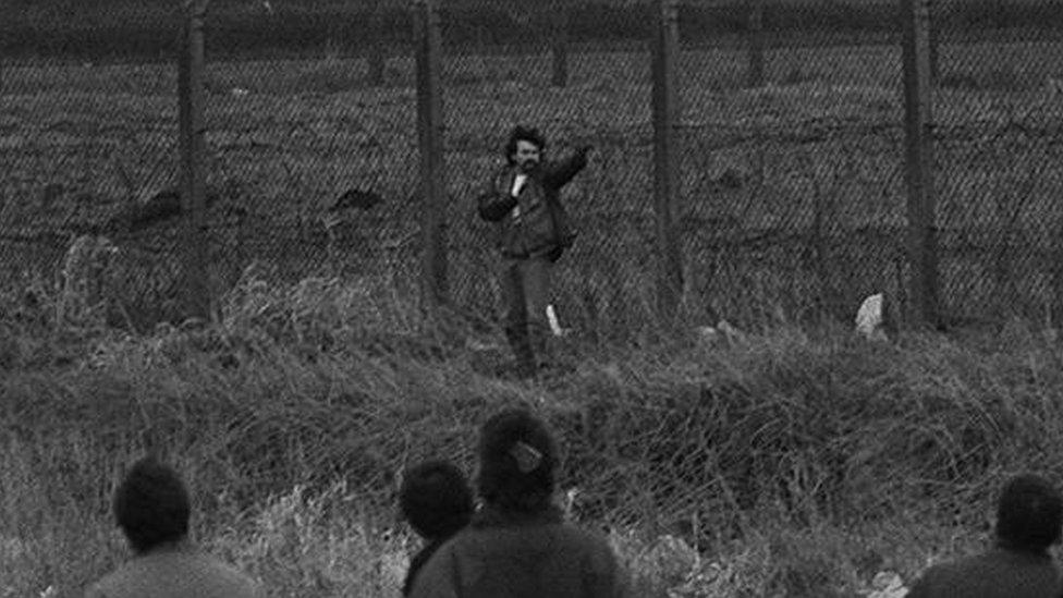 Michael Stone shoots towards mourners at Milltown Cemetery