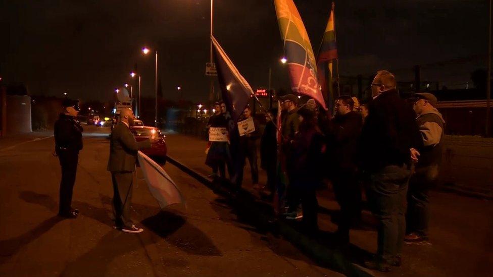 Protestors gathered outside the church