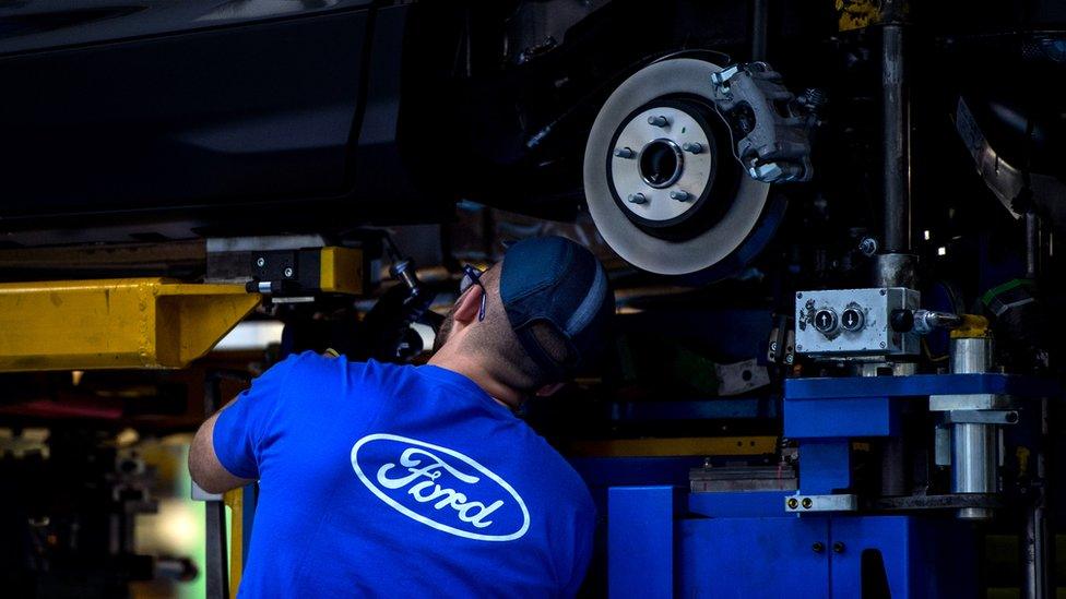 A Ford worker at a factory in the US