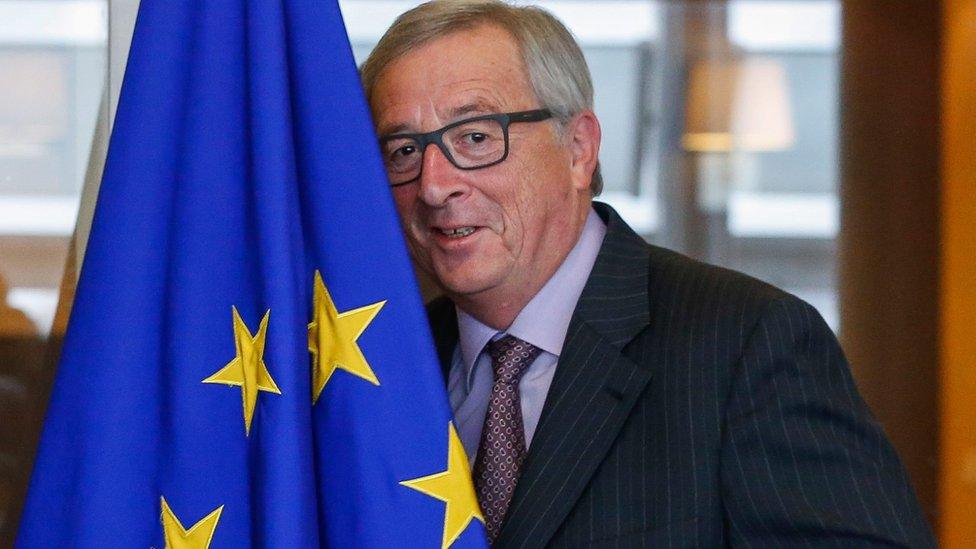 Jean-Claude Juncker with EU flag (10 Nov)