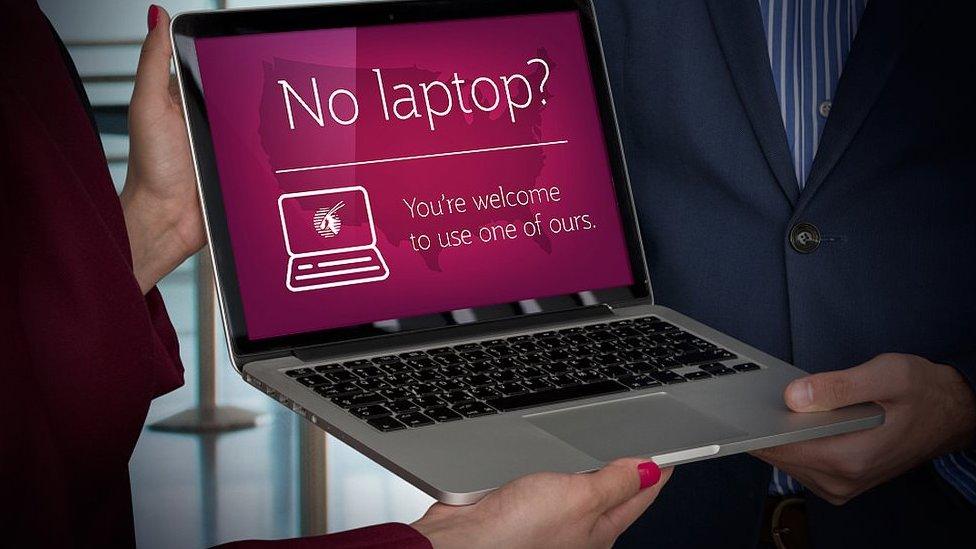 Banners shows laptop loan service by Qatar Airways