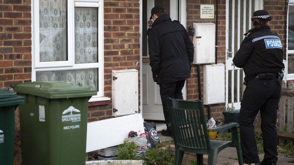 Police enter a property in Viola Avenue