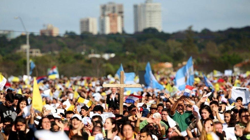 People attending the Mass in Asuncion