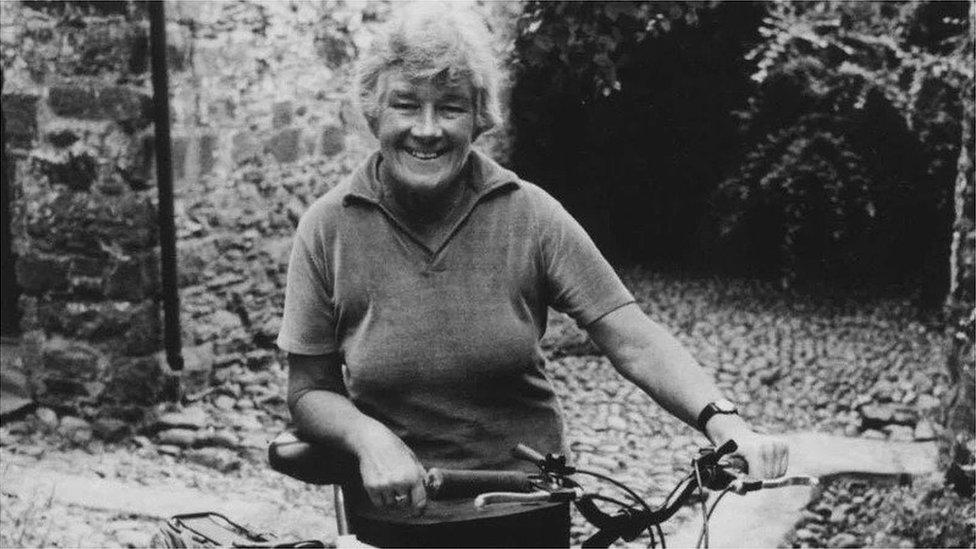 Dervla Murphy with her bike.