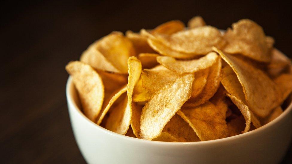 a bowl of crisps