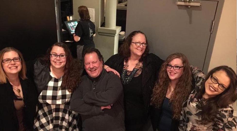 Landon with his wife and four daughters