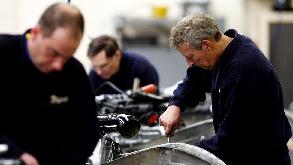 Workers at a manufacturing plant