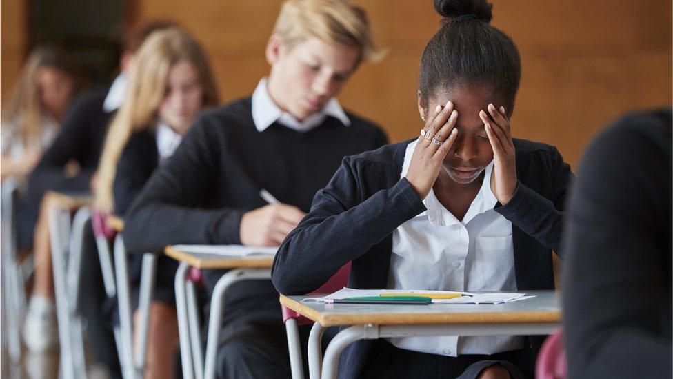 A girl looking stressed during her exams