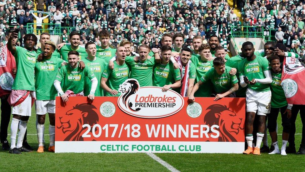 Celtic celebrate after winning the league title during the Ladbrokes Scottish Premiership match at Celtic Park, Glasgow.