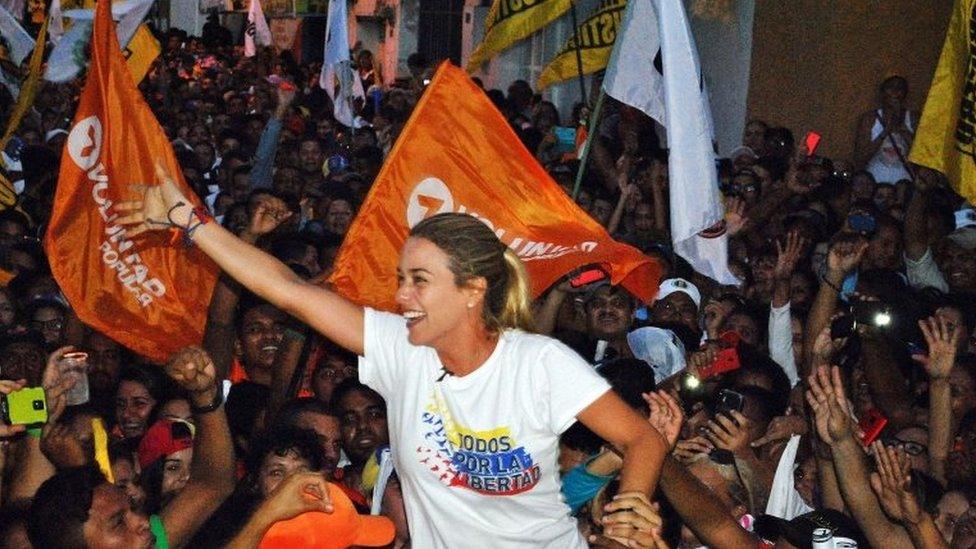 Lilian Tintori, wife of jailed Venezuelan opposition leader Leopoldo Lopez greets supporters during a rally in Guarico state on 25 November, 2015.