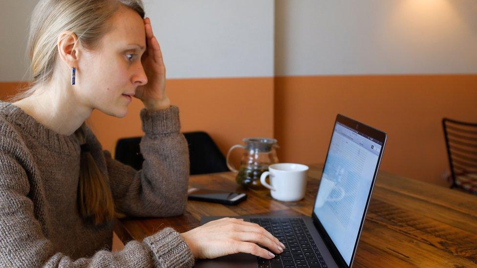 Woman working at laptop