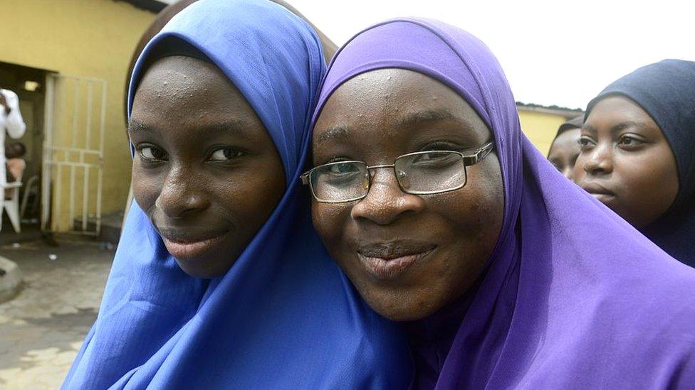 Two students wearing hijabs