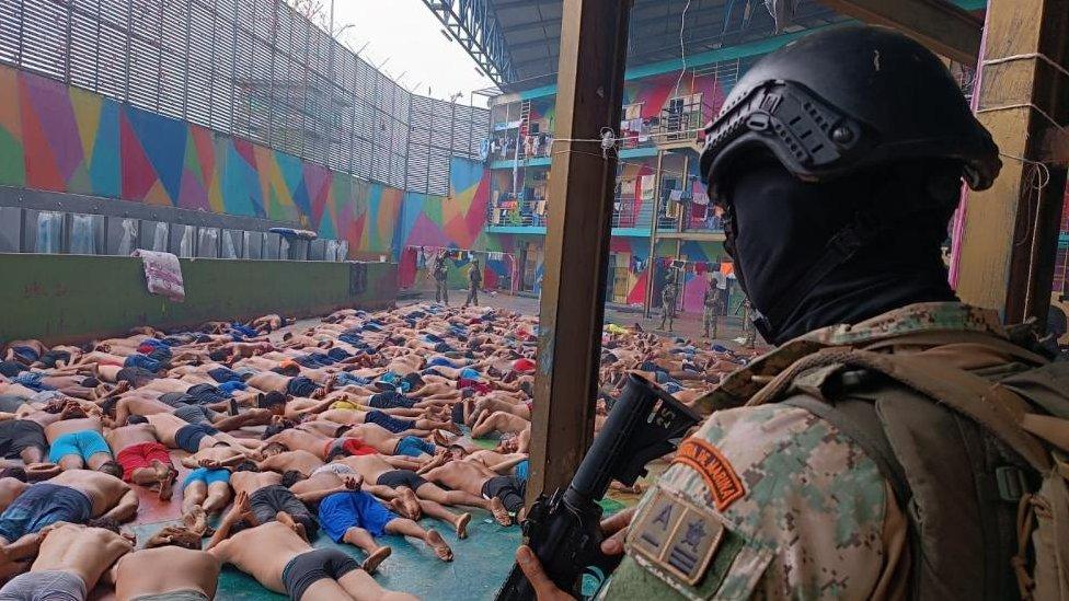 A handout photo made available by the Armed Forces of Ecuador shows Marine Infantry soldiers as they carry out an operation after a riot at the Litoral Regional Prison in Guayaquil, Ecuador, 08 January 2023