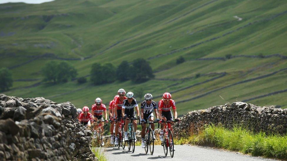 Cyclists in 2014 Tour De France in Yorkshire dales