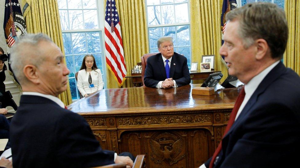 US President Donald Trump looks on during a meeting with China"s Vice Premier Liu He and U.S. Trade Representative Robert Lighthizer (R) in the Oval Office at the White House in Washington, U.S., February 22, 2019.