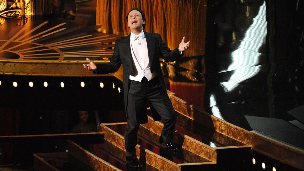 Billy Crystal hosting the Oscars in 2012