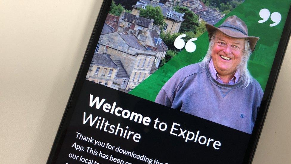 A mobile phone showing the front screen of the Explore Wiltshire app