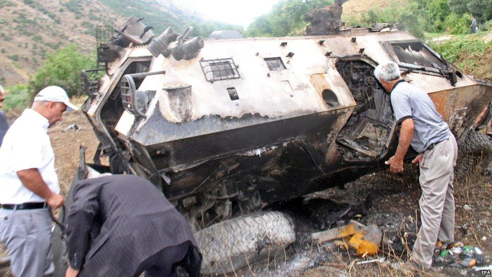 The search for Turkish soldiers' bodies inside a bombed-out army vehicle