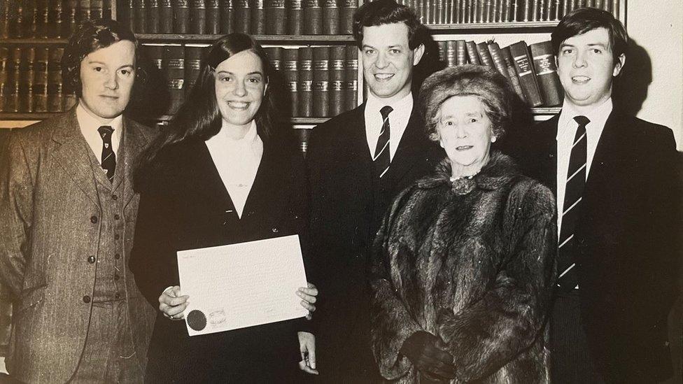 Clare Faulds with her certificate after being sworn-in