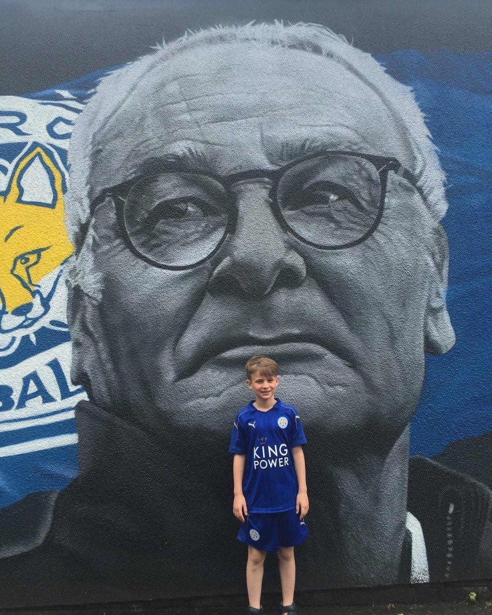 Jack Stephens in front of a Claudio Ranieri mural