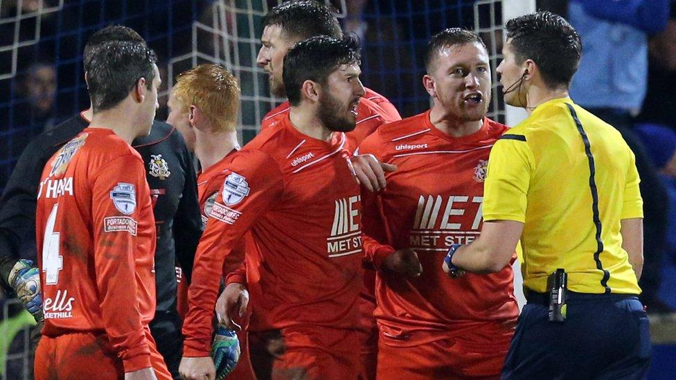 Portadown protest to referee Ian McNabb that Glenavon's late winner should have been disallowed for a foul on keeper David Miskelly