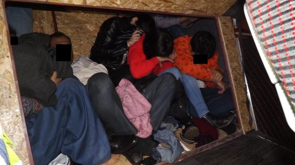 Compartment with seven people inside