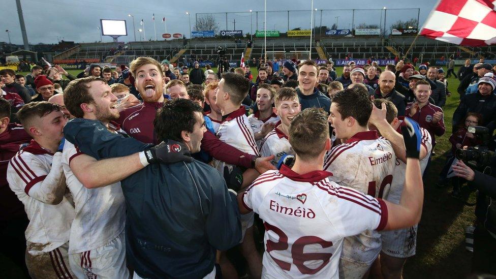 Supporters joined Slaughtneil players on the pitch after the final whistle to celebrate the Ulster title triumph