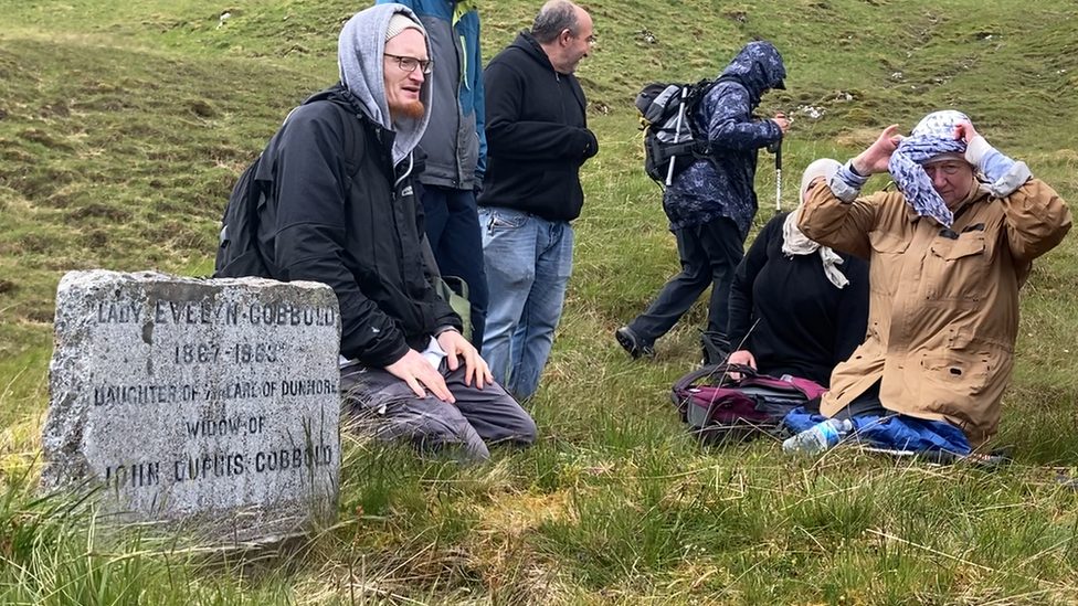 Gathered around Lady Evelyn's grave