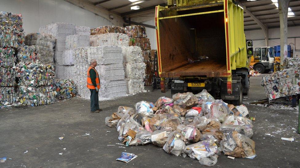 Recycling being offloaded at the States recycling site