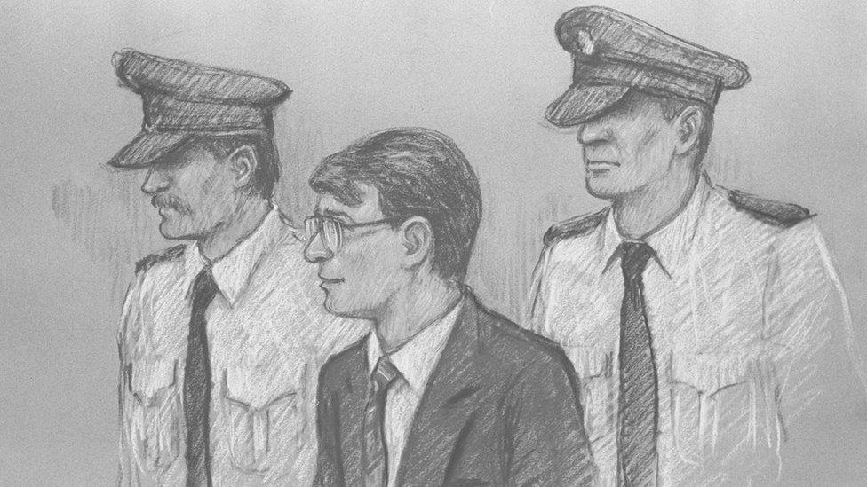 Court sketch of Brian Nelson (centre)