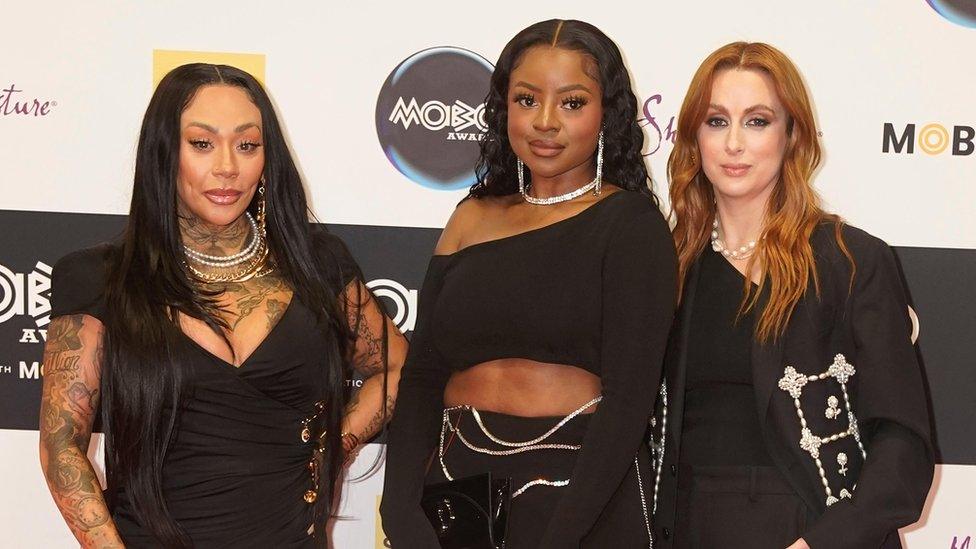 Mutya Buena, Keisha Buchanan and Siobhán Donaghy of the Sugababes on the red carpet at the Mobo Awards in Sheffield. The girl group all wear black